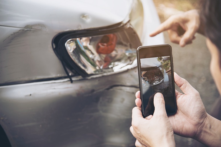 taking photos at an accident scene